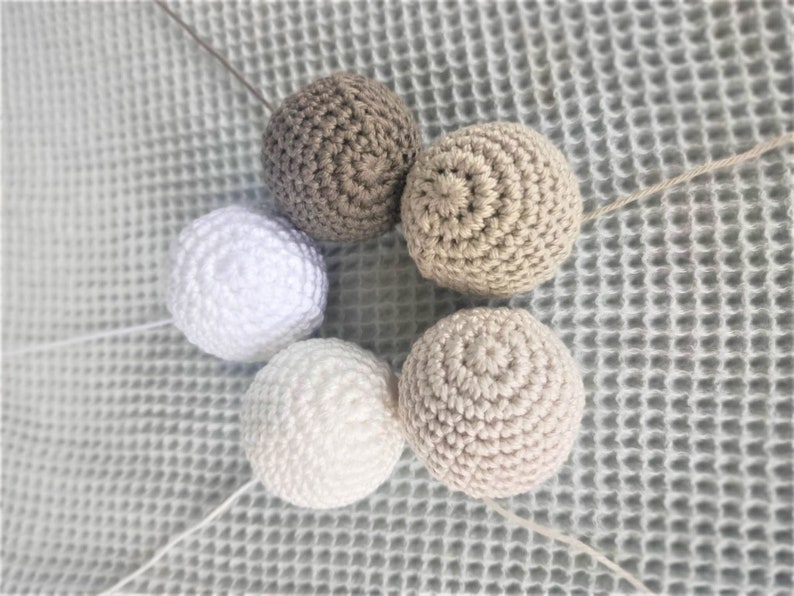 Beige Crocheted Gobbi mobile - balls in a circle