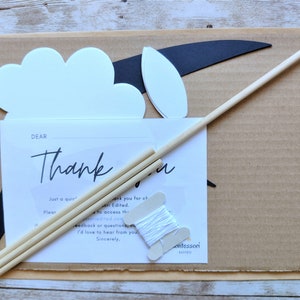 Eco-friendly packaging showing the printable templates and instruction guide for the swallows mobile, ready for gifting or mindful crafting