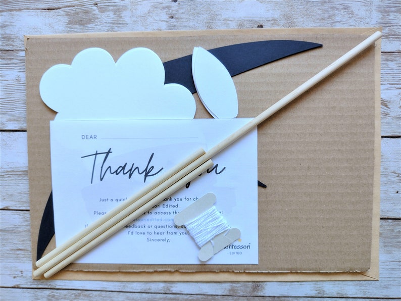 Eco-friendly packaging showing the printable templates and instruction guide for the swallows mobile, ready for gifting or mindful crafting