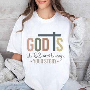 Christian T shirt God Is Still Writing Your Story | christian Shirt | Bible Verse Shirt | Christian Gifts Tshirt Apparel