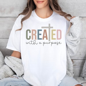Christian Apparel Tshirt mit einem Zweck erstellt | christliches Shirt | Bibel Vers Shirt | Christliche Geschenke Tshirt Bekleidung | Göttliches Gewand|