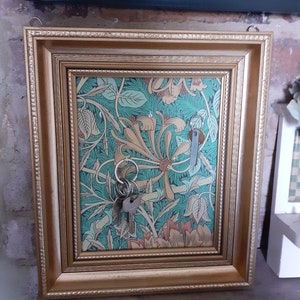 Picture frame with key hooks hotsell