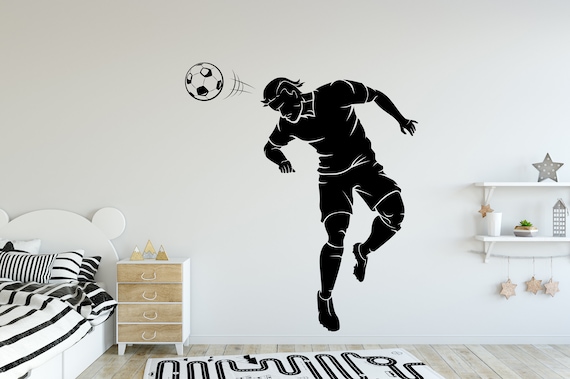 Stickers muraux football. Sticker joueur de foot en action