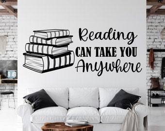 May include: Black and white wall decal with a stack of books and the text "Reading can take you anywhere".