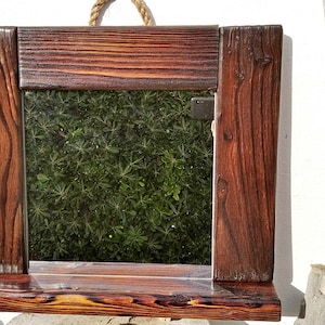 Wooden wall mirror, burnt wood