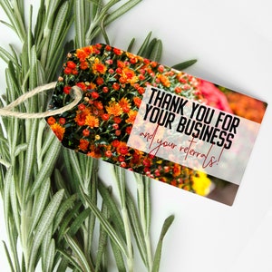May include: A thank you tag with a floral background. The text reads "Thank you for your business and your referrals!"