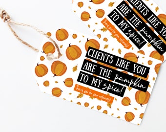 May include: Two white gift tags with a pumpkin pattern and the text "Clients like you are the pumpkin to my spice! Thank you for your referrals!"