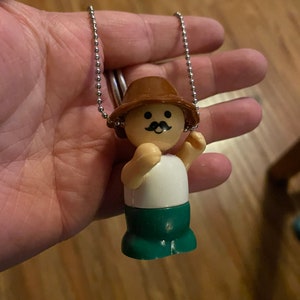 Small authentic Lego on ball chain.