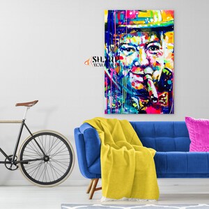 Pode incluir: Uma pintura abstrata colorida de uma pessoa usando um chap&eacute;u e fumando um cachimbo. A pintura &eacute; feita em um estilo vibrante com respingos de cor.