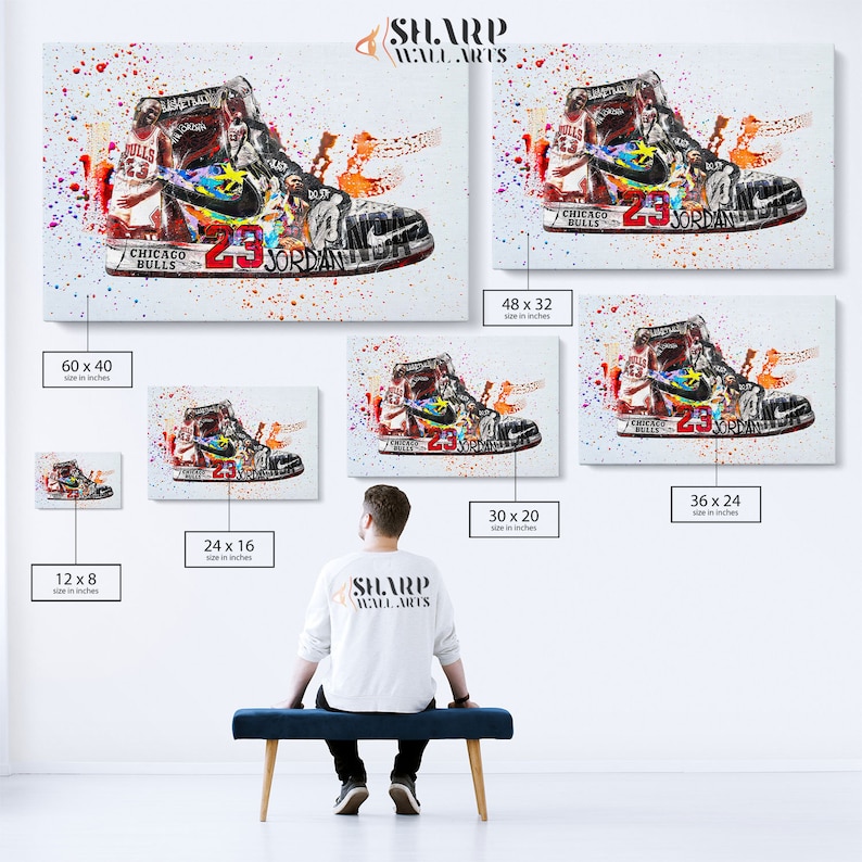 May include: A colorful abstract painting of a basketball shoe with the words "Chicago Bulls" and "23 Jordan" on it. The shoe is surrounded by splashes of paint in various colors, including red, yellow, blue, and green. The painting is available in multiple sizes, ranging from 12x8 inches to 60x40 inches.