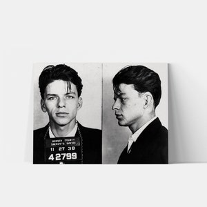 May include: Black and white mugshot of a young man with short dark hair. The mugshot is from the Bergen County Sheriff's Office and includes the number 42799.