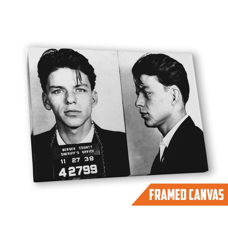 May include: Black and white mugshot of a young man with dark hair. The mugshot is from the Bergen County Sheriff's Office and includes the date 11 27 38 and the number 42799.