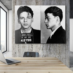 May include: Black and white mugshot of a man with short dark hair. The mugshot is from the Bergen County Sheriff's Office and the man's ID number is 42799.