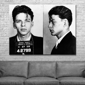 May include: Black and white mugshot of a man with short dark hair. The mugshot is from the Bergen County Sheriff's Office and the man's ID number is 42799.