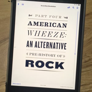 Photo of a Heading page on an ebook reader. Text: Part four, American Wheeze, an alternative pre-history of The Rock.