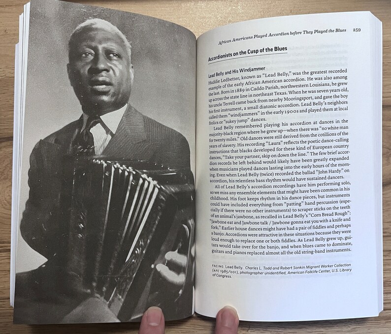 Pages from Accordion Revolution. Left, image: Lead Belly, African American man playing an old fashioned two-stop button accordion he called a wind-jammer. Facing page from chapter 13: African Americans Played Accordions before they Played the Blues.