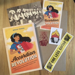 May include: A yellow and black book titled "Accordion Revolution: A People's History of the Accordion in North America from the Industrial Revolution to Rock 'n' Roll" by Bruce Triggs. The cover features a cartoon illustration of a woman playing a red accordion.