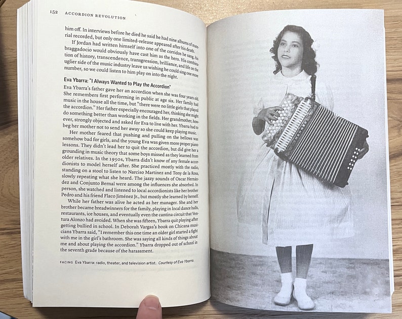 Pages from Accordion Revolution. Left, Text about Eva Ybarra, growing up in Texas where her grandmother didn't want her to play accordion. Right, image: Eva Ybarra, as a young girl in a nice dress, playing three row button accordion.