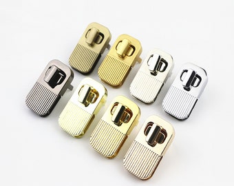 Accessori hardware per borse: chiusura a barra diritta, chiusura a levetta di forma ovale, fibbia twist lock, chiusura per accessori hardware per borse e abbigliamento