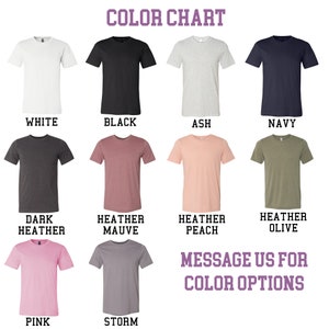 May include: Color chart showing different t-shirt colors, including white, black, ash, navy, dark heather, heather mauve, heather peach, heather olive, pink, and storm. The text "MESSAGE US FOR COLOR OPTIONS" is also included.