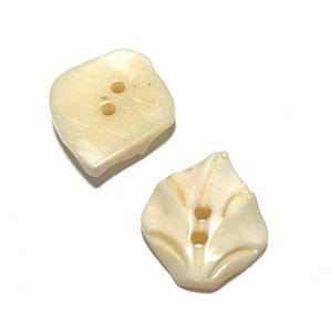 May include: Two off-white, leaf-shaped buttons with two and three holes, respectively. The buttons have a slightly textured surface and a subtle, natural color variation. Ideal for sewing or craft projects.