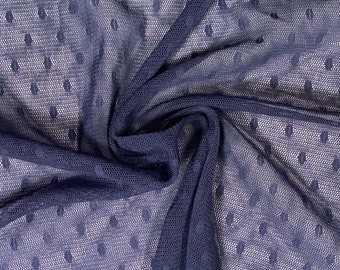 May include: Navy blue sheer fabric with a polka dot pattern. The fabric is soft and delicate, and it has a slightly textured surface.