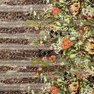 May include: A brown and beige patterned fabric with a floral border. The flowers are in shades of orange, yellow, and white.