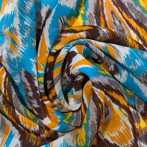 ¡OFERTA! GEORGETTE Estampado - Turquesa / Marrón / Crema / Naranja - Tela Geométrica Ikat del Suroeste. Tela de Confección de Stock Remanente, cortada a medida [F0100]