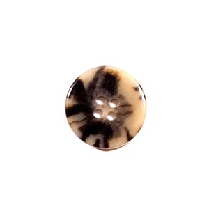 May include: A round, four-hole button with a brown and white marbled pattern.