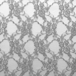 May include: A close-up of silver lace fabric with a delicate floral pattern. The lace is soft and sheer, with a subtle shimmer.