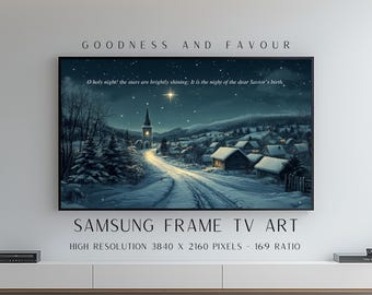 May include: A digital artwork displayed on a television screen featuring a snowy winter village at night with a church, pine trees, and a bright star in the sky. The text reads: GOODNESS AND FAVOUR, O holy night! the stars are brightly shining; It is the night of the dear Savior's birth, SAMSUNG FRAME TV ART, HIGH RESOLUTION 3840 X 2160 PIXELS - 16:9 RATIO.