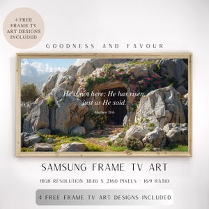 May include: A framed art print featuring a landscape scene with a cave entrance, adorned with pink flowers and greenery. The text "He is not here; He has risen, just as He said. Matthew 28:6" is displayed. The frame is a light brown color.