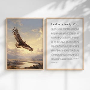 May include: Two framed art prints. One features a painting of a soaring eagle against a sunset sky. The other print displays the text of Psalm 91 in black font on a white background. Both are in light wood frames.