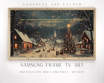 May include: A framed digital art print for a television screen depicting a snowy village at night with a lit Christmas tree, houses with glowing windows, and the text: GOODNESS AND FAVOUR, Behold, a virgin shall be with Child, and shall bring forth a Son, and they shall call His name Emmanuel, which being interpreted is, God with us. MATTHEW 1:23.