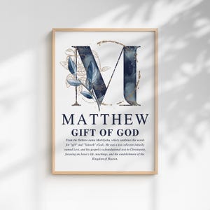 Personalized Christian boy name meaning wall art with navy and gold monogram and Bible description, printable nursery decor.