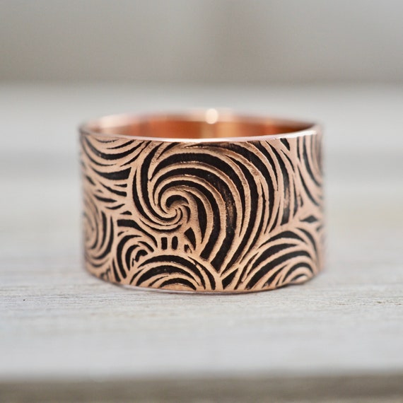 Premium Photo | Metal jewelry handmade. copper rings.