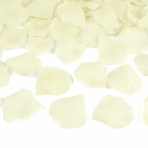 May include: A scattering of ivory silk rose petals, perfect for wedding decorations or special events.