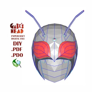 May include: A papercraft model of a helmet with red and blue accents. The helmet is made of paper and is designed to be assembled. The model is called "Gabe's Head" and is a DIY project. The image includes the text "Papercraft Digital File" and "DIY .PDF .PDO".