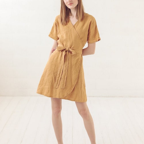linen button through mini dress Lizzy White Linen Mini Dress