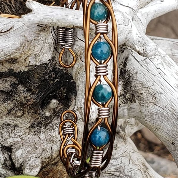 Blue Apatite stones beautifully held with copper wire to make this bracelet