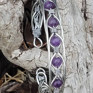 Amethyst in silver coated copper wire