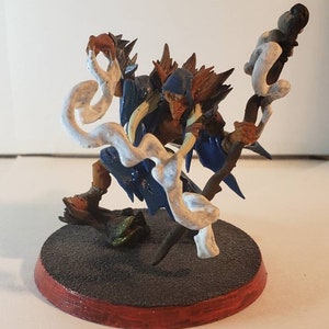 Goblin shaman casting blue robes