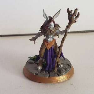 Harefolk rabbit folk female sorceress wizard staff