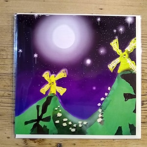 Moinho de vento. Cartão de aniversário divertido. Ovelhas e moinhos de vento. Desenho animado.