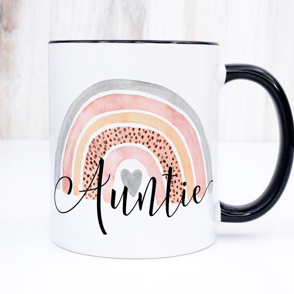 Ceramic Auntie mug with cute rainbow print placed on both sides. Auntie rainbow coffee mug, gift idea for new aunt and baby announcement.