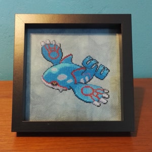 Kyogre Cross Stitch dans le cadre