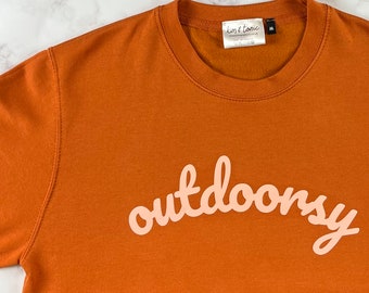 Outdoorsy Sweatshirt. Burnt orange with peach print.