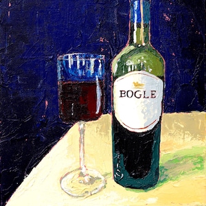 May include: An oil painting depicts a wine bottle and a glass of red wine on a table. The bottle has a white label with the word "BOGLE" on it. The background is a dark blue, and the table is covered with a yellow tablecloth.