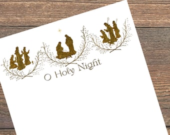 Puede incluir: Un papel blanco con un diseño de silueta dorada que presenta la escena de la Natividad y el texto "O Holy Night". El diseño incluye los tres reyes magos, María, José y el niño Jesús en un pesebre, y una estrella.