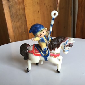Decorazione natalizia a forma di giostra